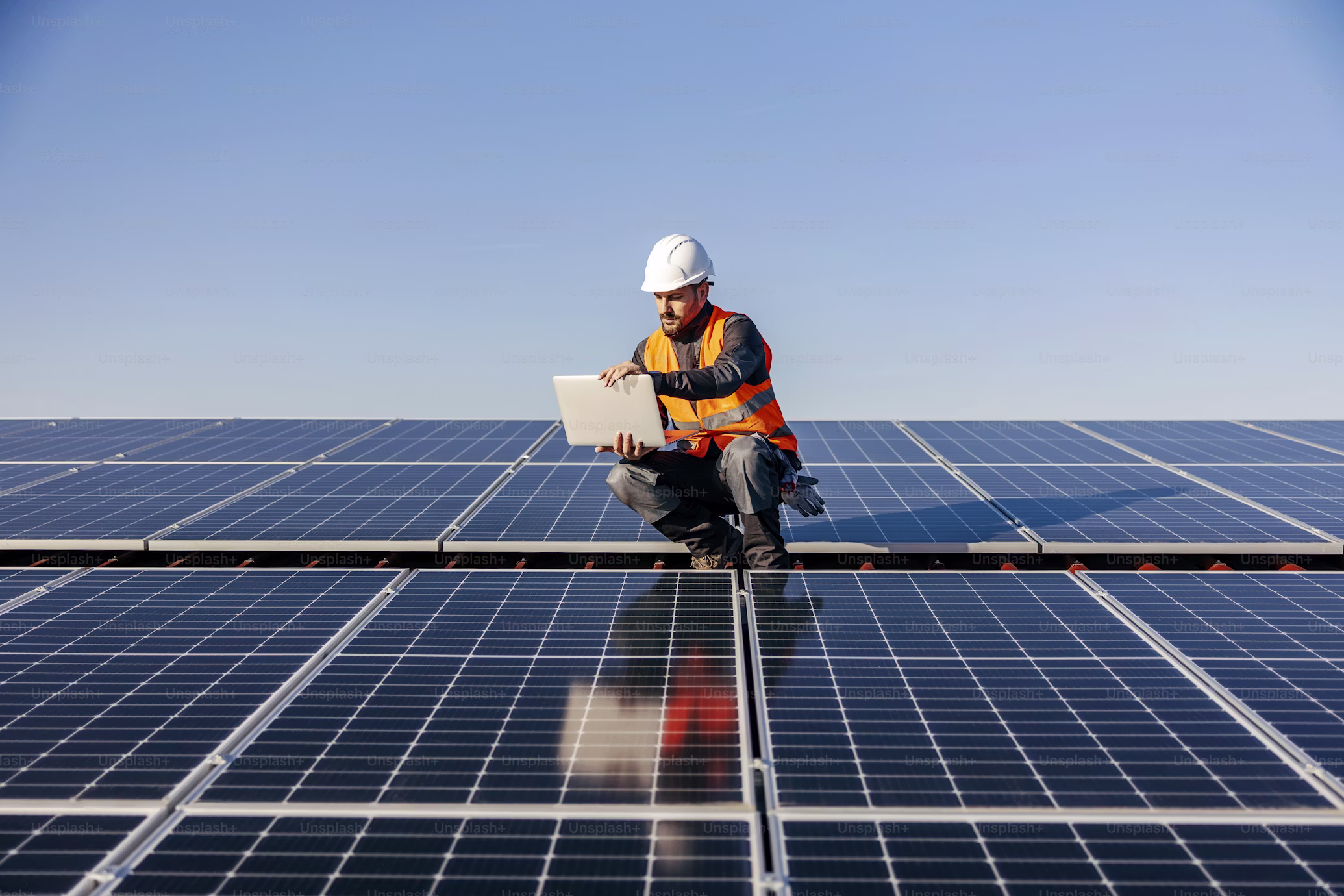 A technician installing GreenProof's edge hardware on-site